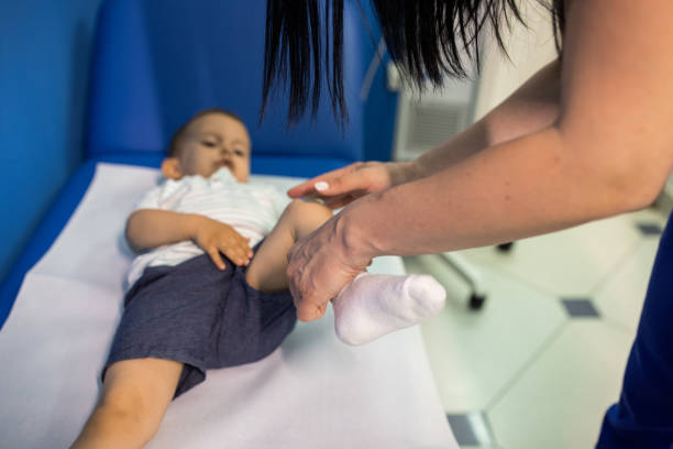 istock Nurse examining a little boy 1405611026