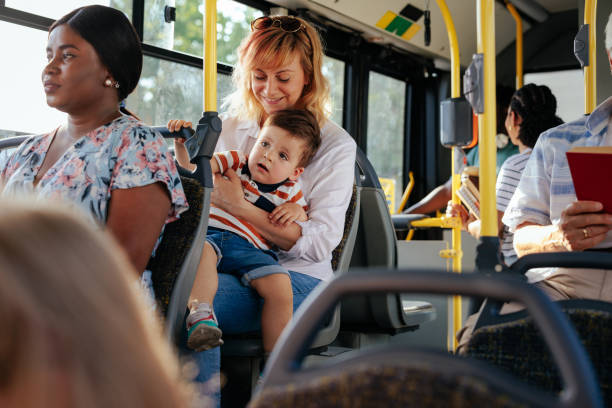 istock Mom and boy in public transport 1405612171