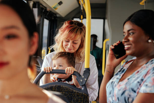 istock The mother and her son are using public transportation. 1405612178