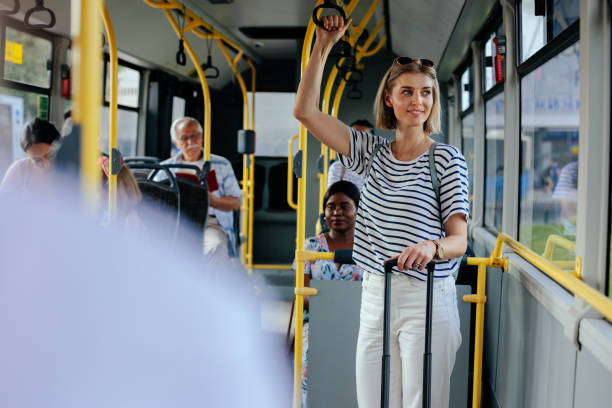 istock Woman in shuttle bus looking through window 1405612202