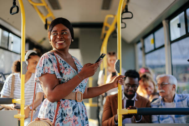 istock Woman with cellphone in public transport 1405612245
