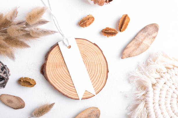 istock Rectangle white tag mockup on a white background with cotton string and boho decoration, dry plants, element for packing 1405612370