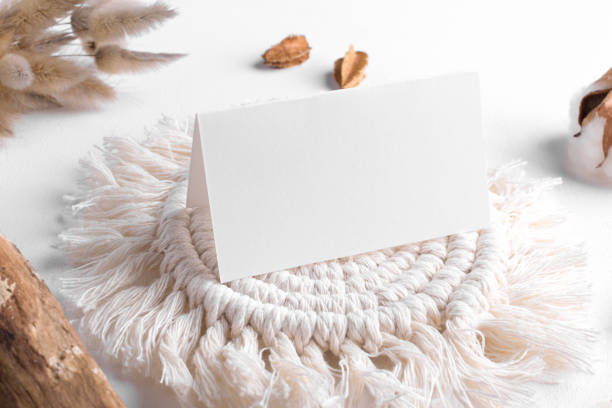 istock Wedding stationery folded blank card mockup 3,5x2 size on white table background with boho decor 1405612376