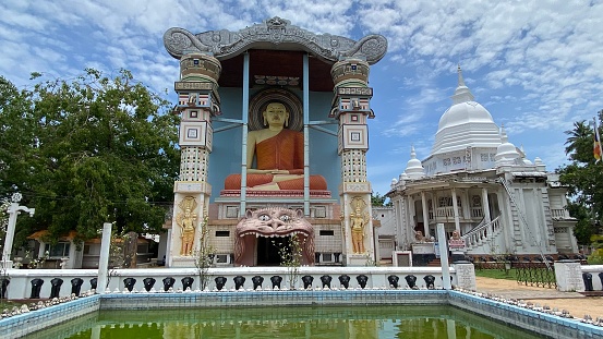 Negombo, Sri Lanka – April 13, 2022: Detail of the architecture in the Buddhist Angurukaramulla Temple of Negombo, Sri Lanka.