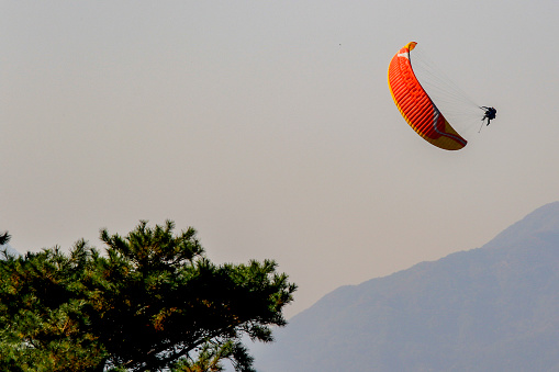 Paragliding above the mountain in Danyang, South Korea