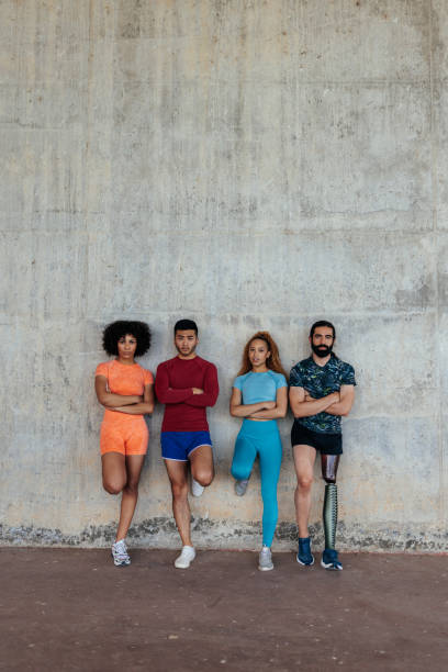 istock Athletes standing in front of wall 1405619902