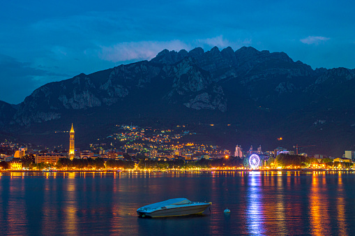 The city of Lecco photographed in the evening.