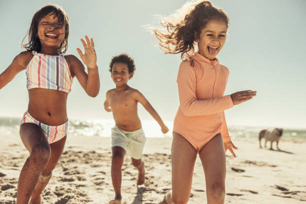 istock Enjoying a fun race at the beach 1405620117