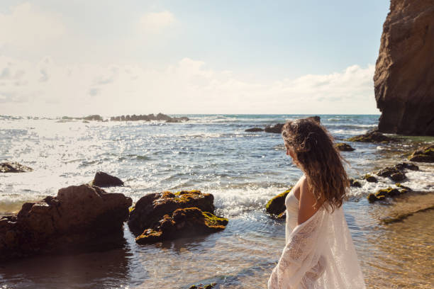 istock Woman at the beach 1405621722