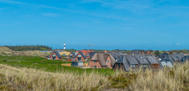 istock View over Kampen on Sylt Germany with Lighthouse in Background 1405625088