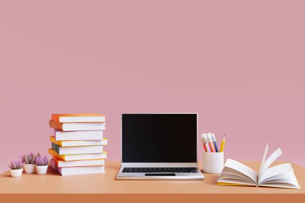 istock School desk with school accessories and laptop on pink background. 3d render 1405627235