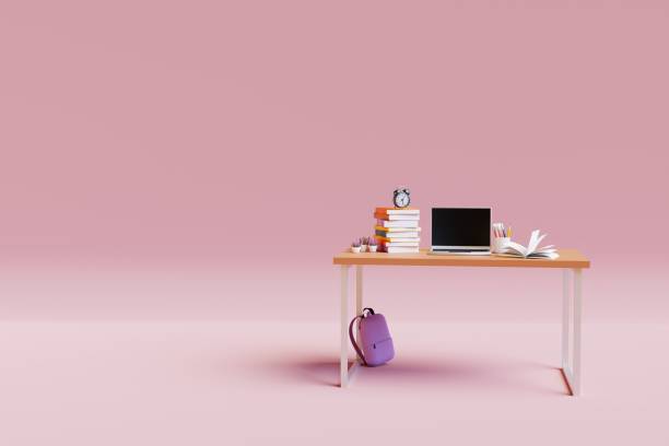 istock School desk with school accessories, laptop and backpack on pink background. 3d render 1405627251