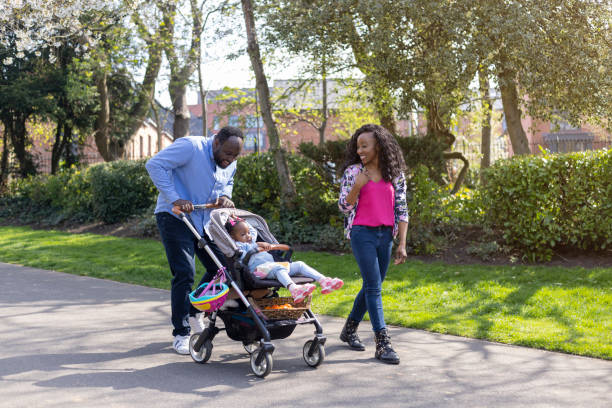 istock Laughing and Smiling at Their Daughter 1405631230