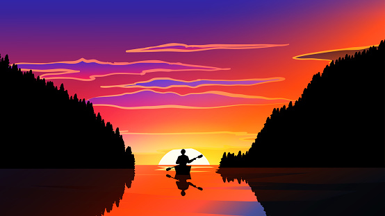 Sunset in coast with a man on canoe and hills