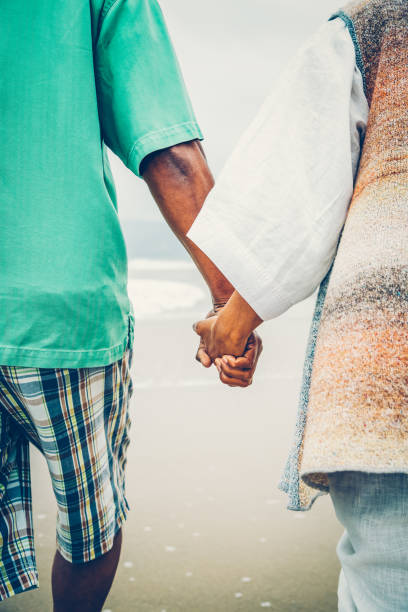 istock Senior African American couple holding hands 1405633228