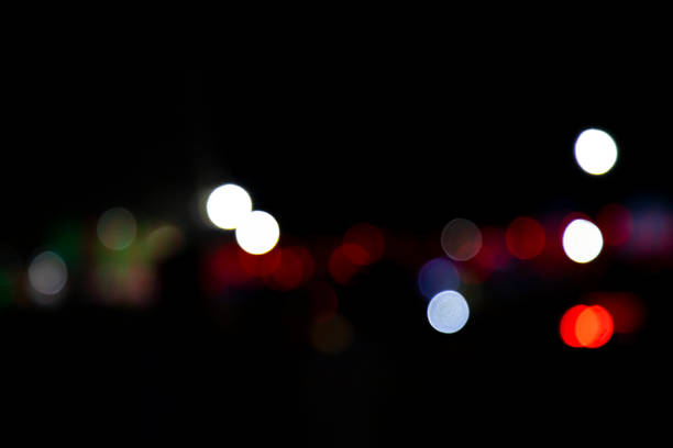 Abstract bokeh light effects on the night. Black background with colorful light effects. background with  Blur bokeh effects. Abstract background texture