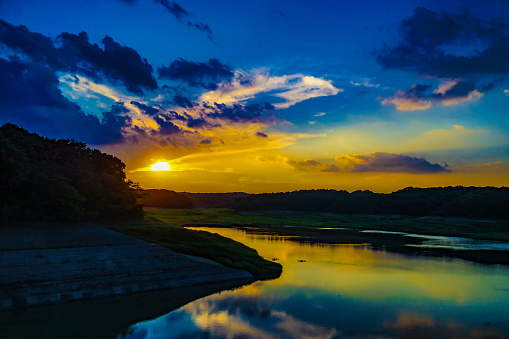 Sunset of the reservoir on Tama Lake and Murayama. Shooting Location: Tokyo metropolitan area