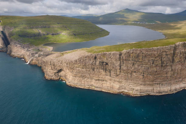istock Faroe islands dramatic coastline in Vagar. Leitisvatn lake 1405635995