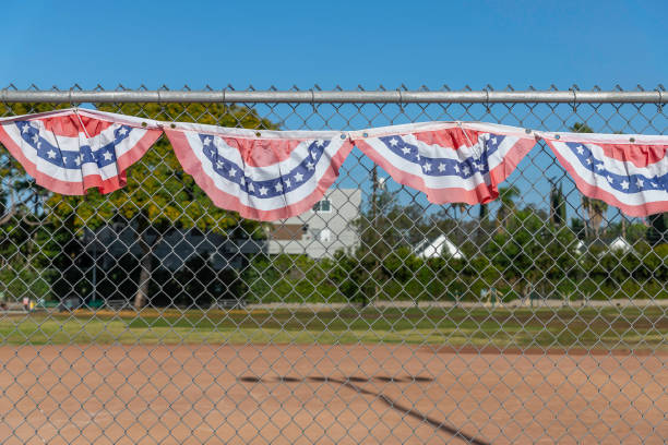 istock Patriotic Bunting on a Baseball Fence 1405637290