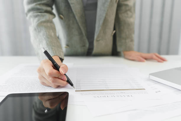 istock Midsection Of Businessman Working At Office 1405641067