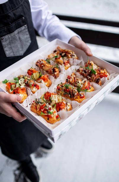 istock Eclairs with salmon, fresh vegetables and herbs, gourmet snacks. 1405642025