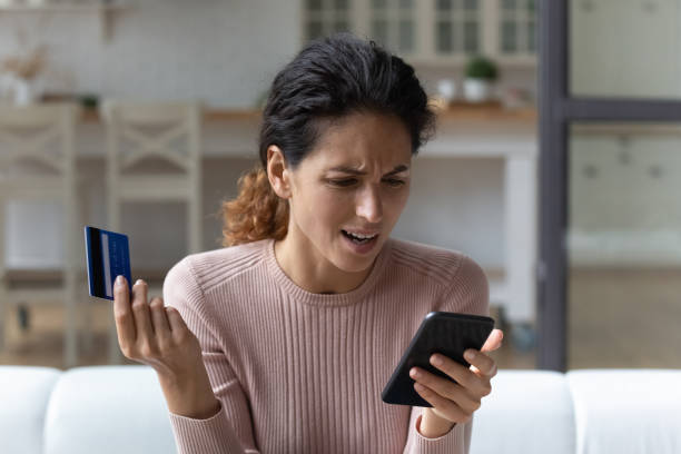 istock Annoyed lady ebank client enter wrong password from credit card 1405643448