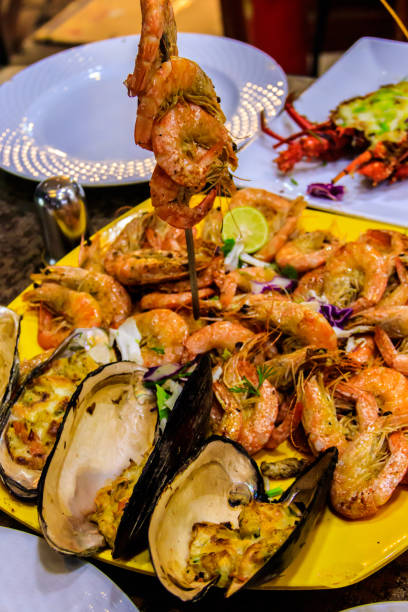 istock Tasty prawns and mussels in plate in restaurant 1405643621