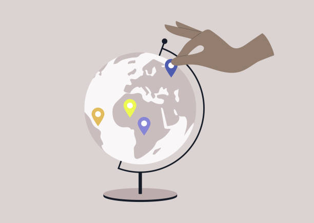 istock A round Globe on a metal stand with location pin stickers on it, educational and travel concept 1405643781