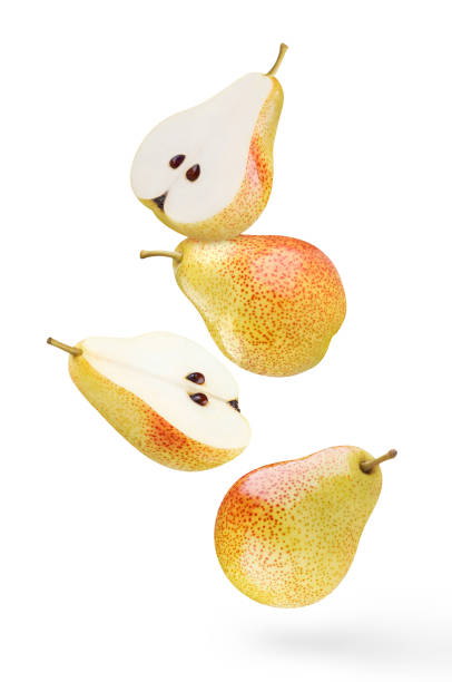 istock Flying delicious pears on white 1405644999