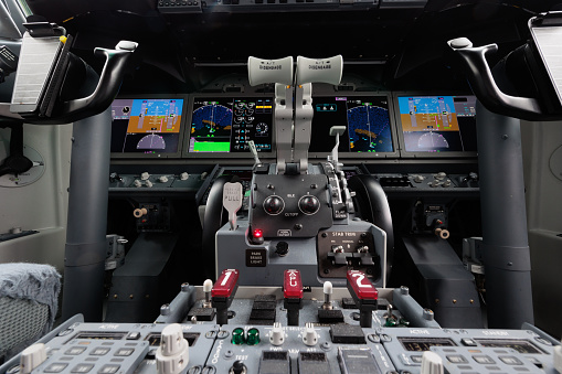 A view of the flightdeck. Visible in the frame are the stabilizer trim cutout switches which are used to deactivate the MCAS system in the event of a malfunction.