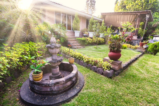 Sunbeams on the house and garden