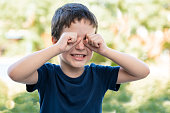 istock Child suffering itching scratching eyes 1405648808