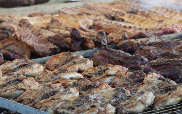 istock mixed meat in quantity on the grill to cook 1405649774