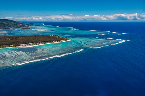 Tropical coastline at Mauritius with blue Indian ocean. Aerial view