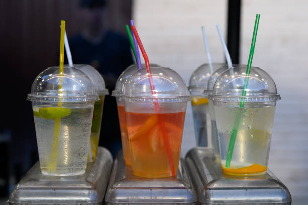 istock Different colors of cold water in a plastic cup. 1405653814