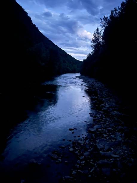 istock River between mountains in the blue hour of the day. 1405654513