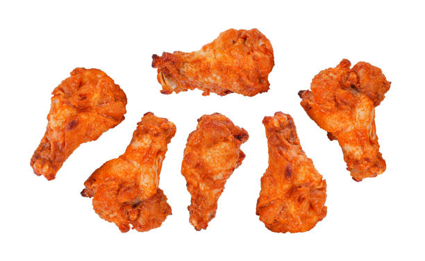 istock Barbecue chicken legs isolated on white 1405655498