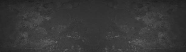istock Black anthracite stone concrete texture background panorama banner long 1405657145