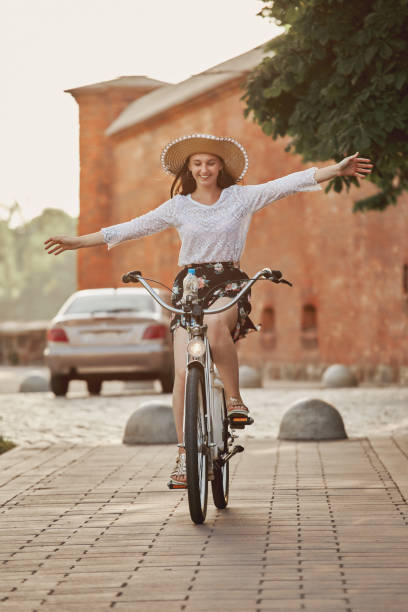 istock girl cyclist biking 1405666977