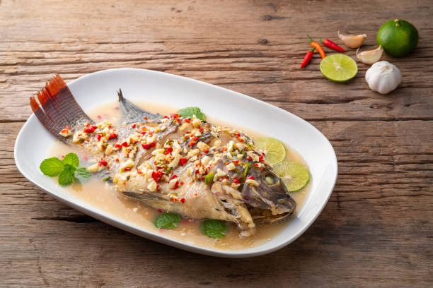 istock Steamed Tilapia Fish In Spicy Lime Soup 1405668894