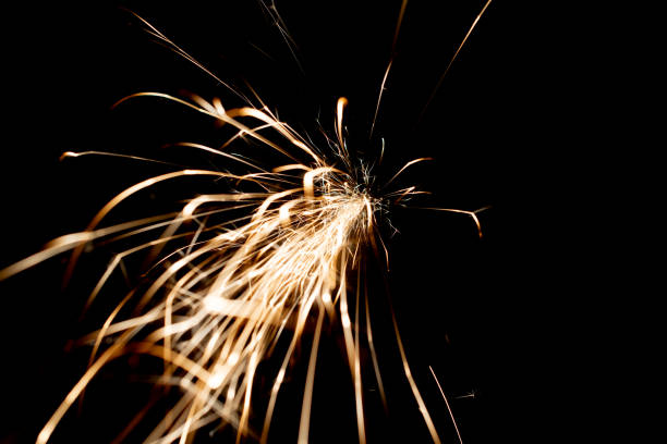 istock sparks in the dark. lines of light. 1405673113