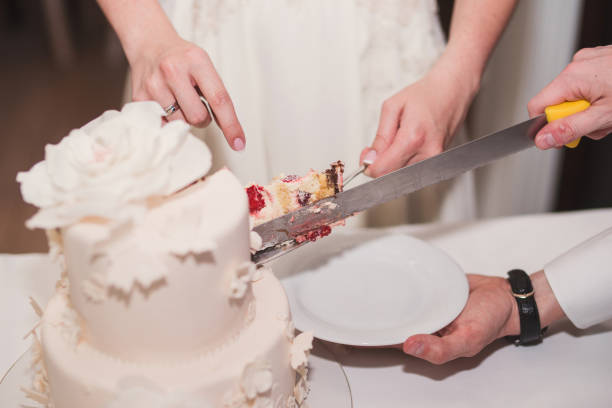 istock Beautiful wedding cake decorated with fresh flowers and greenery. 1405676856