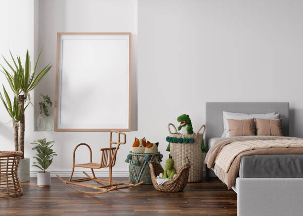 istock Empty vertical picture frame on white wall in modern child room. Mock up interior in scandinavian, boho style. Free, copy space for your picture. Bed, toys. Cozy room for kids. 3D rendering. 1405677086