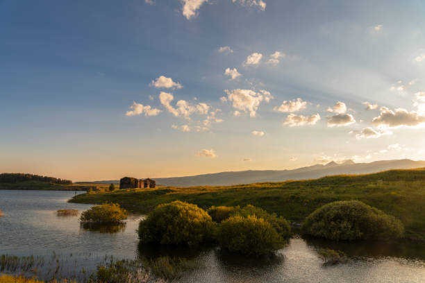 istock Beautiful panoramic landscape sunset over the river and hills. 1405677361