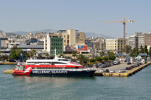 Piraeus, Athens, Greece - June 2022: Fast ferry Flying Cat 6 of Hellenic Seaways, moored in the port of Piraeus. There is an extensive ferry network to the Greek Islands.