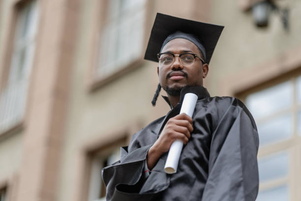 istock Black ethnic student celebrating his graduation 1405682603