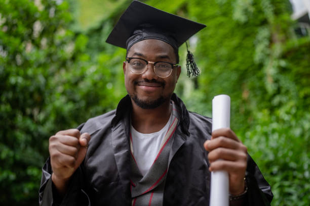 istock Black ethnic student celebrating his graduation 1405684410