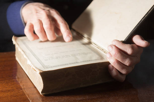 istock old woman read bible 1405684431