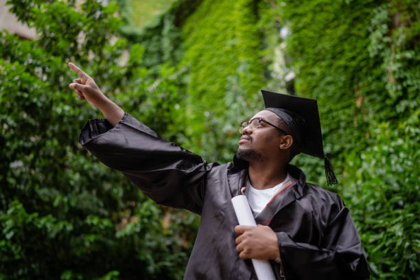 istock Black ethnic student celebrating his graduation 1405684515