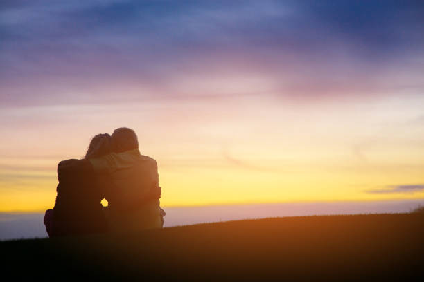istock Back view of sitting couple. 1405686868